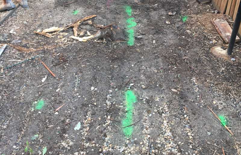 Underground sewer line located and marked